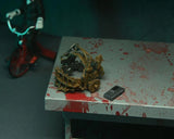 NECA: Saw- Ultimate Jigsaw (Red Robe) *Pre-order*